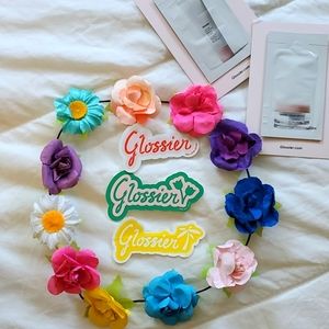Glossier sticker spring 2022 with priming moisturizer and priming balance sample